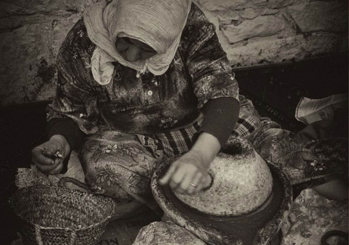 Moroccan women preparing traditional natural cosmetic ingredients